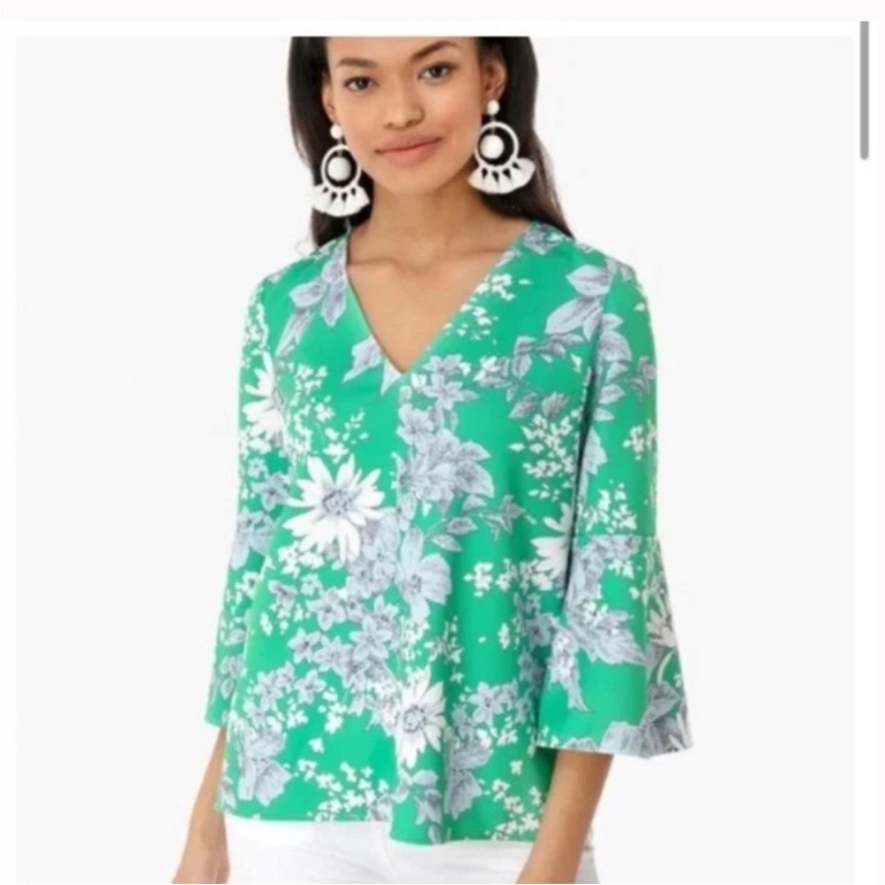 Tuckernuck floral blouse. Size M.